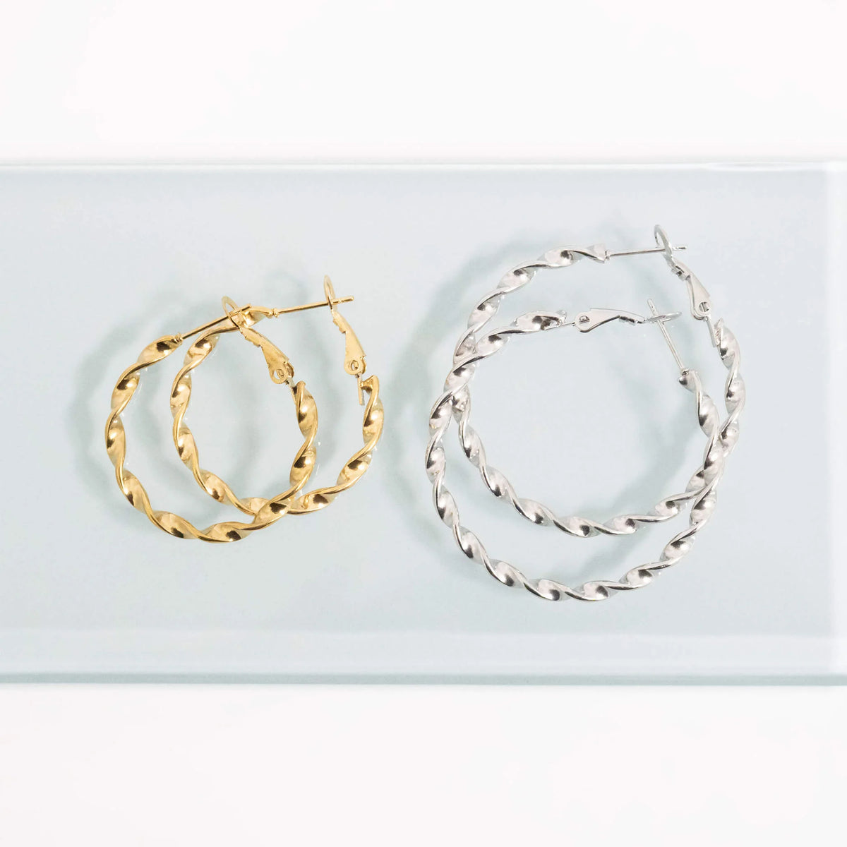 Aster Twist Hoop Earrings | silver