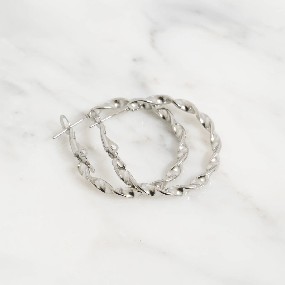 Aster Twist Hoop Earrings | silver